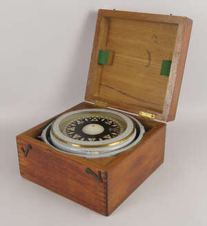 
	
		A painted metal maritime compass, mid 20th century, on a metal gimbal,  in a wooden box,...