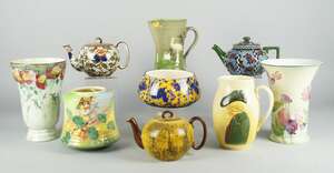 
	
		A Group of Royal Doulton comprising: a Series ware Fish J, The Old Wife in Australia vase...