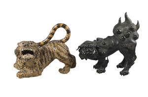 
	
		A Chinese bronze Buddhist lion, early 20th century, 37cm high and a stoneware model of a...