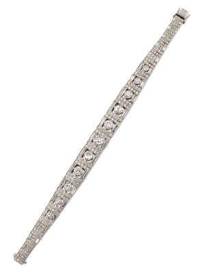 
	
		A diamond bracelet, composed of a series of brilliant and baguette-cut diamond graduated...
