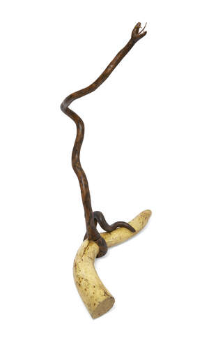 
	
		An Indian polychrome decorated carved wood model of a snake, 19th century, modelled with...