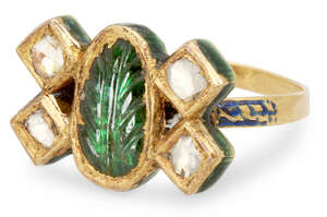 
	
		A diamond and emerald-set gold ring, India, 20th century, the central oval emerald with a...