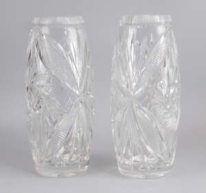 A pair of glass vases, 20th century, of ovoid form, decorated with geometric and leaf form cutting, 32cm high (2)