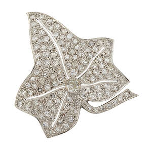 
	
		A diamond brooch, modelled as a pave single-cut diamond leaf with single old...
