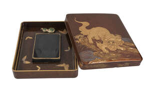 
	
		A Japanese lacquer suzuribako, Meiji period, the rectangular cover finally decorated with...