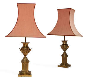 
	
		A pair of Regency style gilt-brass table lamps, first half 20th century, each urn mounted...