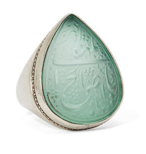 
	
		An inscribed seal in a silver mount, Iran, 20th century, drop-shaped bezel set with a...