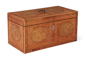 
	
		A George III satinwood three-division tea caddy, the inlaid two section top with loop...