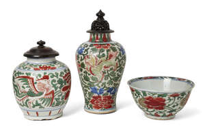 
	
		Three pieces of Chinese wucai porcelain, Transitional period, with a vase decorated with...