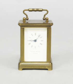 
	
		A Matthew Norman miniature brass carriage clock, 20th century, 6cm high

	

