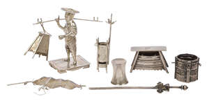 
	
		A small Chinese silver figure, Hong Kong, marks of Wing Nam, designed as a man carrying a...