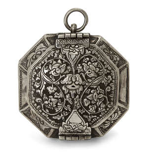 
	
		A repousse decorated silver Malay octagonal lime paste box, early 20th century, decorated...