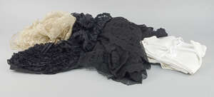 
	
		A black lace mantilla, together with two black lace blouses, cream lace blouse, lace cap...