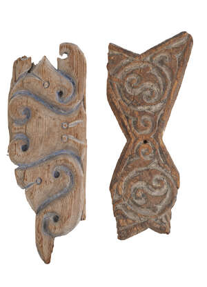 
	
		Two carved wood elements, Tulunid, 9th and 12th century, the first possibly from a panel,...