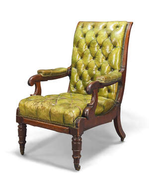 
	
		A William IV mahogany reclining armchair by Roberts Daws, with green button back leather...