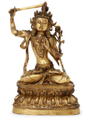 
	
		A Sino-Tibetan gilt bronze figure of Manjushri, late 19th century, seated in vajrasana on...
