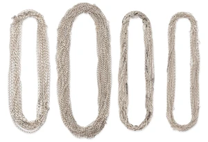 A group of chains, to include curb link, figaro link, and mariner link examples, of various...