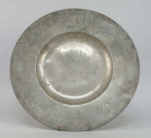 
	
		An English pewter charger, attributed to Samuel Smalley, late 17th century, later...