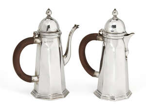 
	
		A pair of silver café-au-lait pots, Birmingham, c.1926, S. W. Smith & Co., comprising...