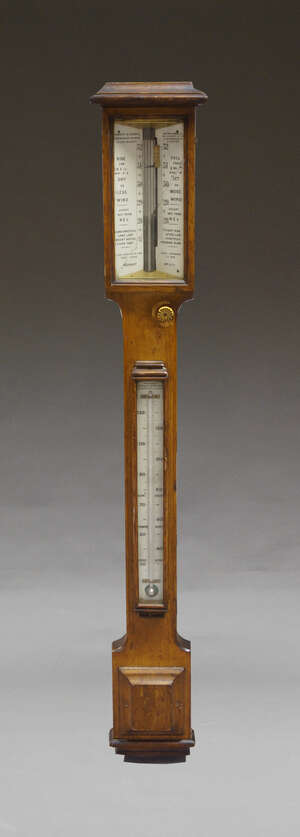 
	
		A Negretti and Zambra oak cased barometer, 19th century, with ivory indicator boards,...