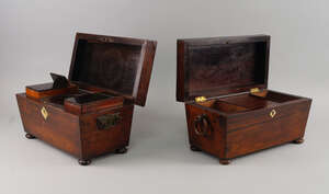 
	
		A Regency rosewood tea caddy, of sarcophagus form with ring handles, on bun feet, 32cm...