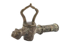 
	
		A bronze tap with lion head spout,  Spain or Iran, 12th/13th century, 19cm. long ...