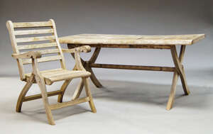 
	
		A teak wood garden table, late 20th Century, the slatted rectangular top, on folding x...