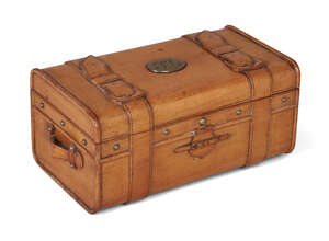 
	
		An unusual satinwood jewel casket, mid-19th century, in the form of a carved leather...