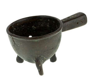 
	
		A Chinese bronze ladle, Ming dynasty, 16th century, the handle pierced with geometric...