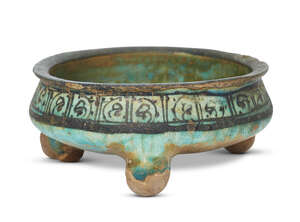
	
		An Ayyubid Raqqa ware underglaze painted pottery bowl, Syria, first half of the 13th...