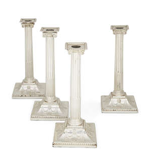 A set of four George III silver candlesticks, three London, c.1775, probably John Carter II, one Sheffield, c.1793, John Parsons & Co., all of Corinthian colum