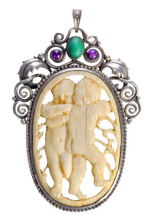 
	
		A German Jugendstil silver and ivory pendant   
		c.1920, marked on the bail900 and with...