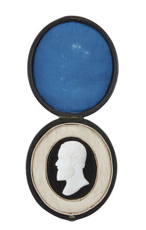 
	
		An early Victorian white paste portrait relief of a gentleman, c.1840, mounted on black...