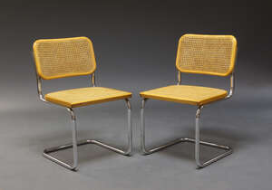 
	
		After Marcel Breuer, a pair of 'Cesca' cantilever chairs, the beech and caned frames on...