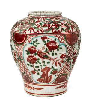 
	
		A Chinese Zhangzhou ware vase, Ming dynasty, painted in red and green enamels with panels...