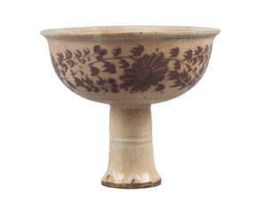 A Chinese provincial porcelain stem cup, Yuan dynasty, molded to the interior with two dragons, painted to the exterior in underglaze copper red with chrysanth