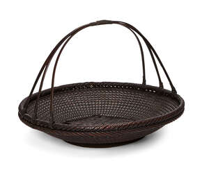 
	
		A Japanese bamboo basket by Hayakawa Shokosai I, Japanese 1815-1897, of morikago fruit...
