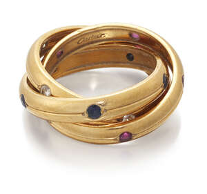 
	
		Cartier, a Trinity ring, by Cartier, accented with circular-cut rubies and sapphires and...
