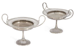 A pair of Edwardian Mappin & Webb small silver tazzas, London, c.1905, each designed as a circular dish with pierced border and wheat sheaf armorial to base, t