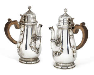 A pair of Victorian silver café-au-lait pots, London, c.1928, Mappin & Webb, designed as...