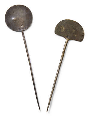 
	
		Two South American silver tupu, 17th century, one with disc terminal the other with demi...