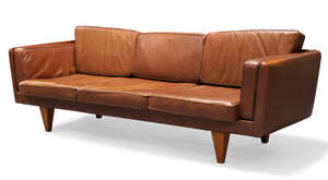 
	
		Illum Wikkelsø (1919-1999), a model 'V11' brown leather sofa made by Holger Christiansen ...