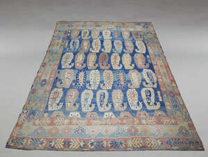 
	
		A Turkish Soumak carpet with rows of botehs in a blue field with multiple polychrome...