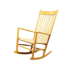 
	
		Hans J. Wegner (1914-2007), a beech model 'J16' rocking chair,
		c.1980,
		the spindle...