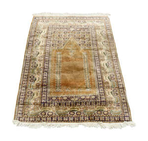
	
		A West Persian silk prayer rug, mid to late 20th century, with Mihrab field, enclosed by...