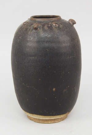 
	
		A Chinese stoneware black glazed jar, Song dynasty, of ovoid form, with studded...
