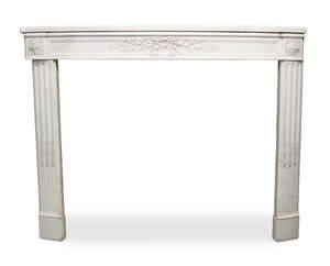 
	
		A white marble fireplace, late 19th/early 20th century, the bow front shelf above frieze...