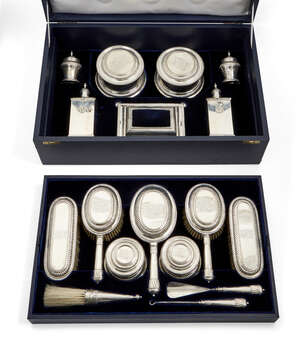 
	
		An impressive George V silver dressing table service, 1927-1932, London, Lionel Alfred...