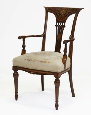 An Edwardian marquetry and mahogany armchair, first quarter 20th century, the top rail decorated...