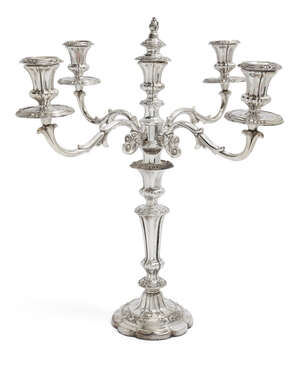 
	
		A large silver plated candelabra candlestick, c.1840, the baluster stem raised on a lobed...